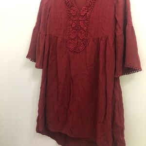 Wine dress with sleeve and neckline details